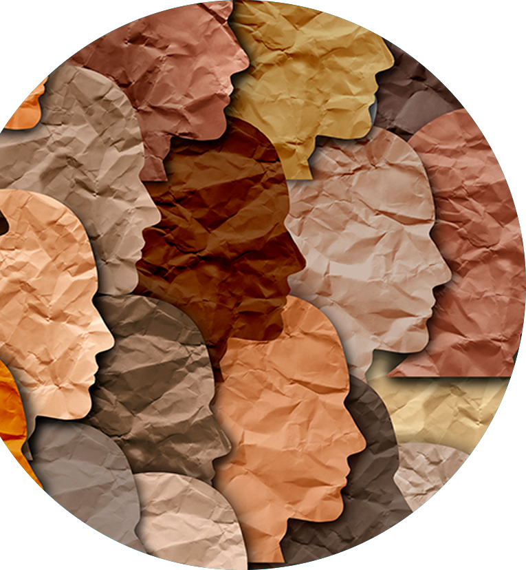 Se muestra una fotografía con los perfiles de rostros en papel arrugado de colores